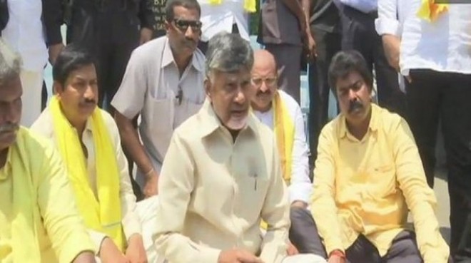 AP CM stages protest against I-T raids on TDP candidates